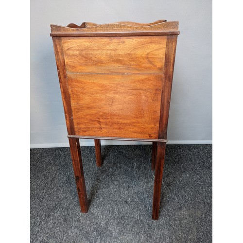 792 - 19th century bedside cabinet, the square top with wavy gallery, above tambour door opening to interi... 