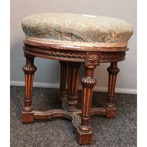 766 - 19th century Gothic revival stool [Holland & Sons] the circular cushioned seat above a carved moulde... 