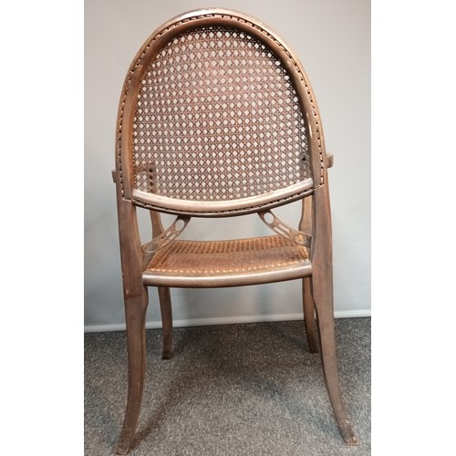 763 - 19th century oak chair, with caned shaped back and seat raised on square out swept legs [88x57x48cm]