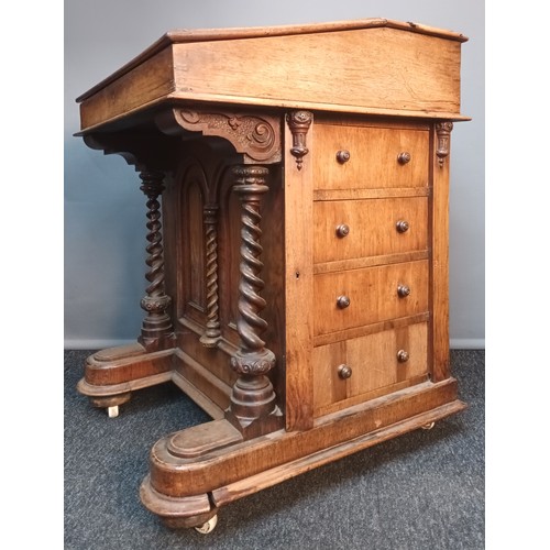 767 - 19th century Walnut davenport, the top with two sliding sections leading to compartments and lift up... 