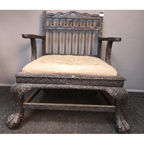 768 - Pair of antique oriental dark wood chairs, the back with carved stretchers and spindles above open a... 