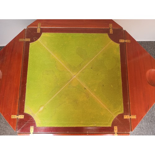 794 - 19th century games table, the square top with banding and four triangle sections opening to a green ... 