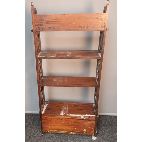 804 - Antique style mahogany unit, four open shelves flanked by pierced and carved sides, above four short... 