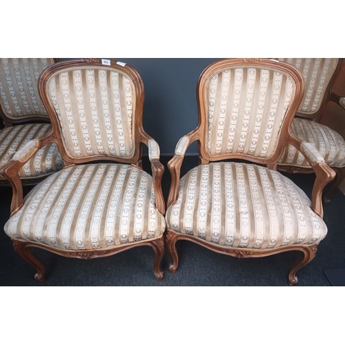 814 - Lot of four 19th century chairs, the shaped and cushioned back above two open arm supports and cushi... 