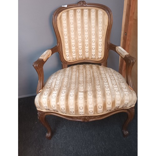 814 - Lot of four 19th century chairs, the shaped and cushioned back above two open arm supports and cushi... 