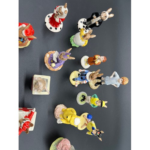 633 - A Collection of Royal Doulton and Royal Albert figures, Includes Winnie the Pooh, Beatrix potter and... 