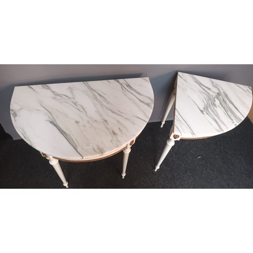 824 - Two French style demi lune table, the marble top raised by turned tapered legs, together with a corn... 