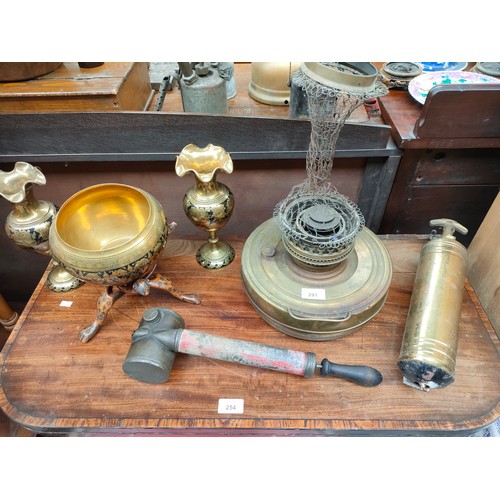 291 - Selection of antique brass ware includes oil lamp , brass fire extinguisher etc .