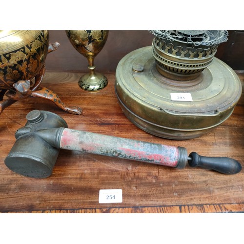 291 - Selection of antique brass ware includes oil lamp , brass fire extinguisher etc .