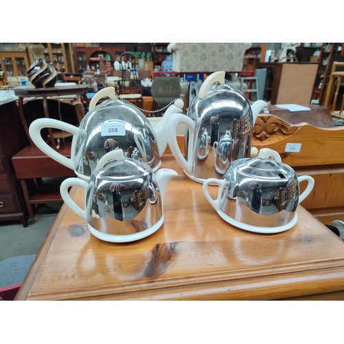 288 - 4 piece art deco chrome and ceramic tea service .