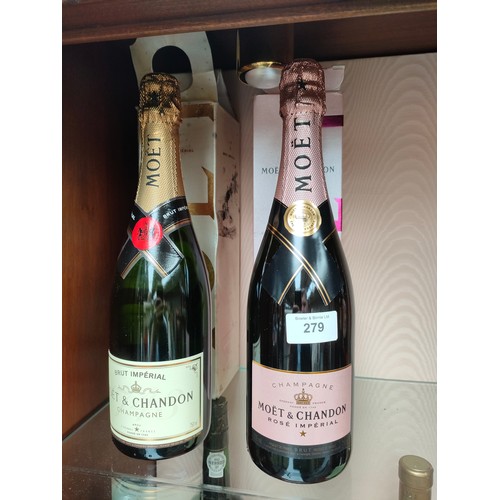 279 - 2 Bottles of Moet Chandon champagne.