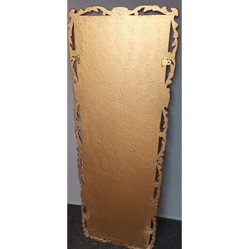 835 - Full length antique style rectangular mirror, the peripheral with moulded gilt design (128x44cm)