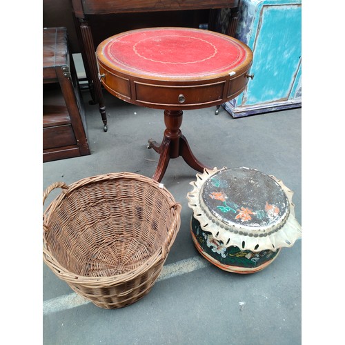 255 - Leather topped drum table , eastern themed small drum together with basket.