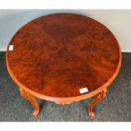 851 - Antique style mahogany table, the circular top with moulded edging above carved apron and cabriole l... 