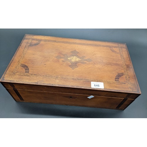 646 - Antique writing box, the inlaid top opening to a brown material slope and compartments