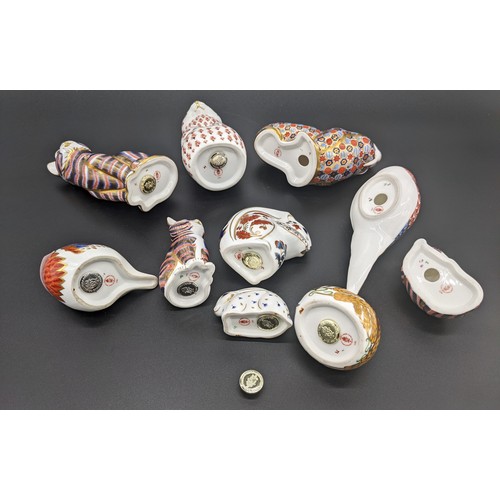 553 - Collection of Royal Crown Derby porcelain animal figurines, some with gold/silver button (10)