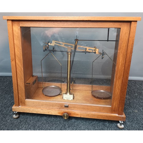 567 - Cased balancing measuring scales, produced by Baird & Tatlock London.