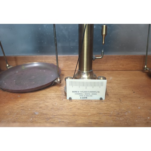 567 - Cased balancing measuring scales, produced by Baird & Tatlock London.