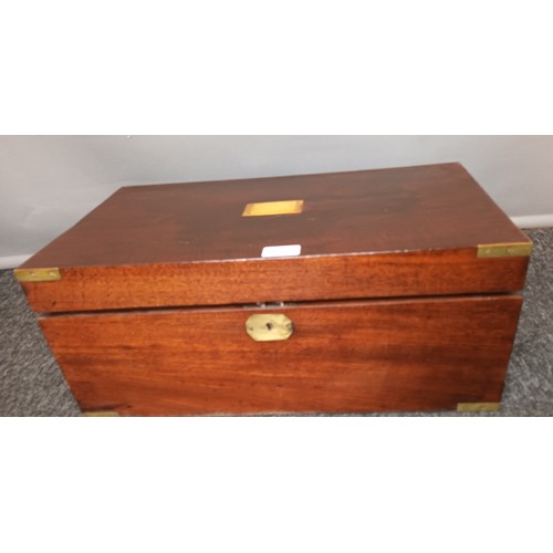 568 - Antique mahogany writing slope, fitted with inlaid brass trims and handles, Has two hidden drawer to... 