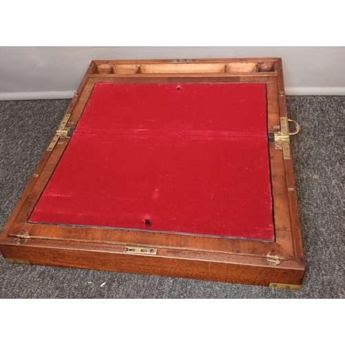 568 - Antique mahogany writing slope, fitted with inlaid brass trims and handles, Has two hidden drawer to... 