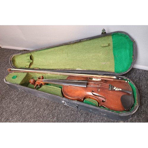 569 - 19th century violin with bow, comes with coffin case, bow named Grimm, Violin is inscribed in pencil... 