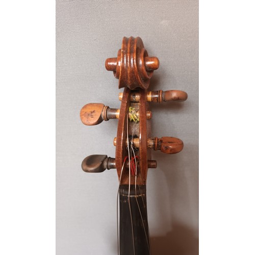 569 - 19th century violin with bow, comes with coffin case, bow named Grimm, Violin is inscribed in pencil... 