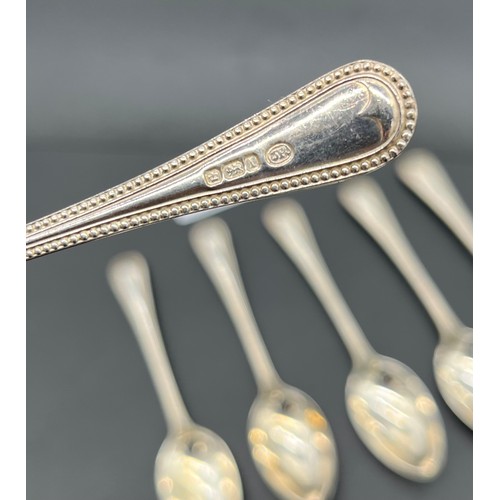 508 - 6 Sheffield silver tea spoons with matching sugar tongs. [194grams]