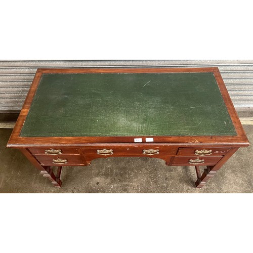 832 - Antique mahogany desk, the rectangular top with a green surface area above a centre drawer flanked b... 