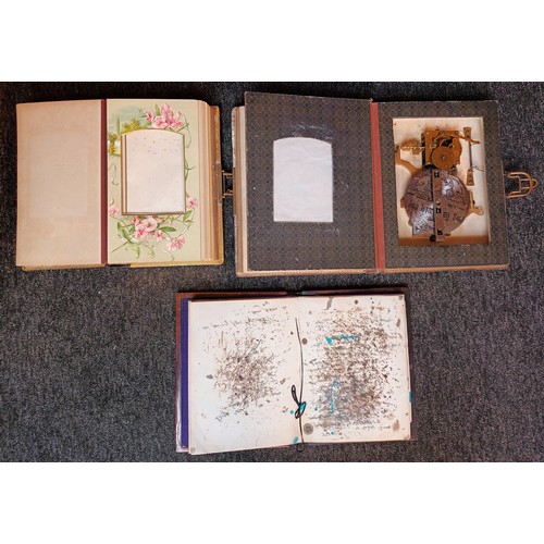 576 - Two antique photo albums, one fitted with a Junghins  symphonium. Together with antique blotter.