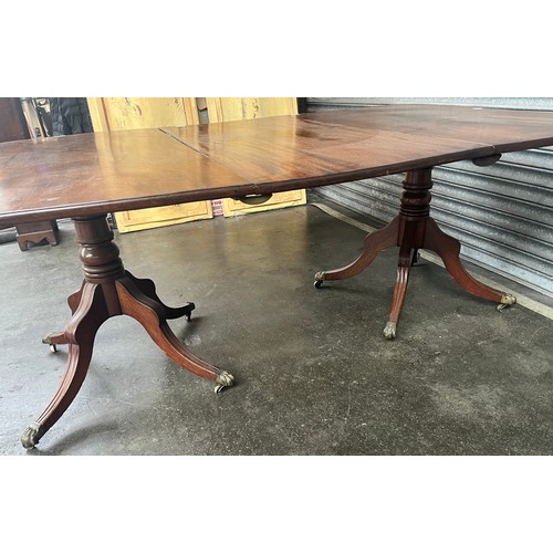 837 - 19th century extending table, the two d-ends separating to allow for inserting leaf, raised on two t... 