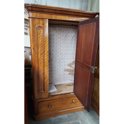 861 - Antique wardrobe, the shaped moulded cornice above a central mirrored door leading to interior stora... 