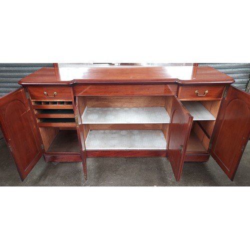 863 - 19th century mahogany sideboard, the mirror with shaped moulded frame above a pull-out narrow centre... 