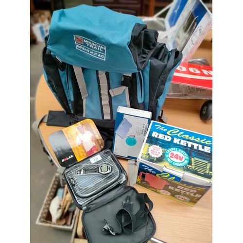 431 - Mountain hikers ruck sack , polar watch , boxed jenreader etc .