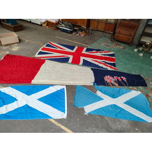 410 - Lot of vintage flags and vintage Britain small flags etc.