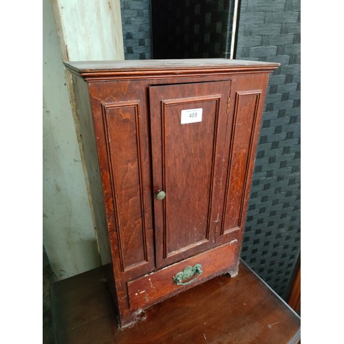 405 - Antique miniature furniture product of a single wardrobe with single under drawer.