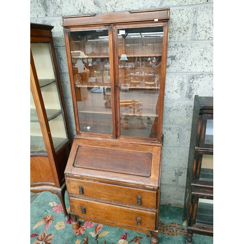 402 - Antique two drawer bureau book case .