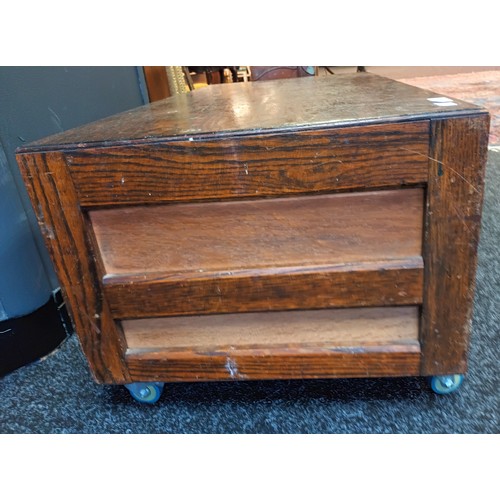 857 - Vintage oak bank of drawers [8 in total] Supported on modern wheels. Hight 40 cm x W 50 cm x L 97 cm