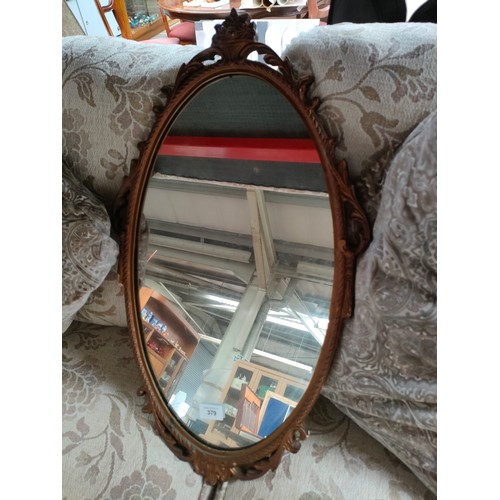 379 - Vintage ornate mirror .