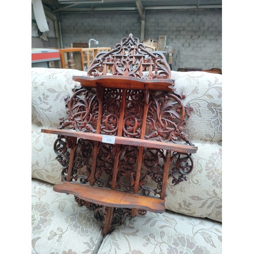 378 - Antique style carved wall shelving unit .