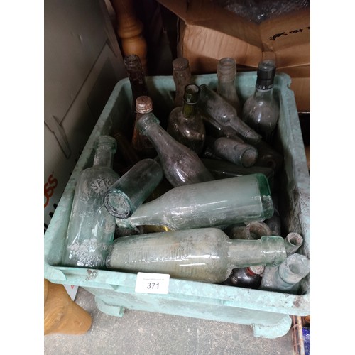 371 - Box of collectable antique bottles .