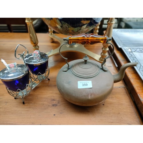 359 - Amber handled brass kettle together with double section preserve dish.