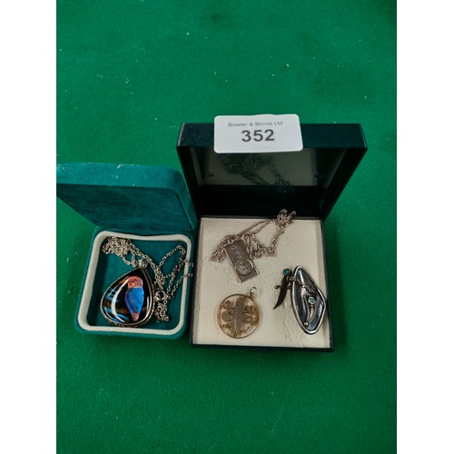 352 - Selection of silver jewellery includes silver ingot saint Christopher pendant etc .