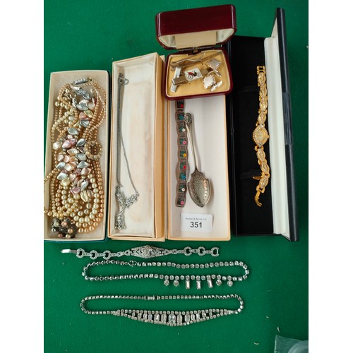 351 - Lot of jewellery to include ornate bracelet , simulated beads etc .