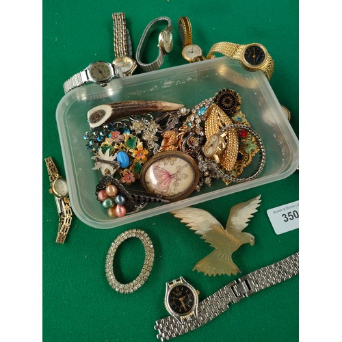 350 - Selection of vintage brooches and watches to include sekonda .