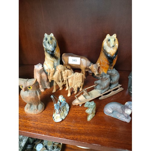 345 - Selection of carved wooden items includes Black forest hand carved bears on sledge etc.