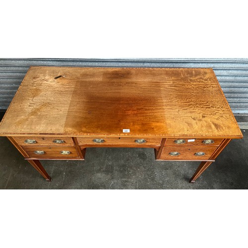 840 - 19th century knee hole desk, the rectangular top with banding above an arrangement of short drawers ... 