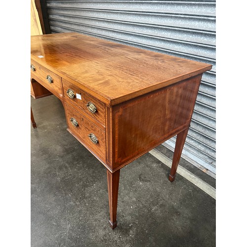 840 - 19th century knee hole desk, the rectangular top with banding above an arrangement of short drawers ... 