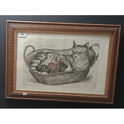 694 - Maxine Juan Limited edition etching depicting cat within a basket, Signed. 678/200.  [Frame 42x59cm]