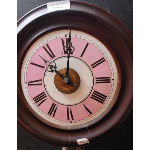 896 - Antique barrel wall clock with white and pink enamel face. Comes with weights and pendulum. [Non run... 