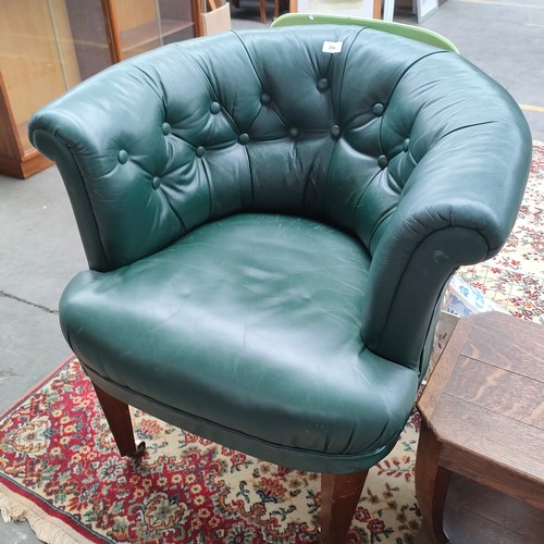 396a - 19th century Antique horse filled leather button back tub chair .